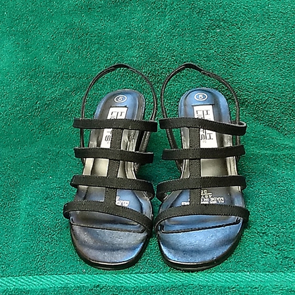 Strappy, gladiator sandals. Black with 2 inch heels.